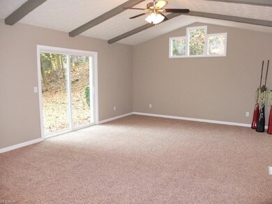 Great room with vaulted ceiling.