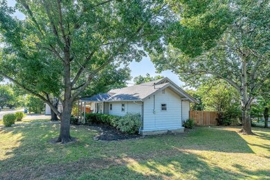 View of home's exterior with a yard