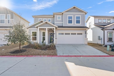 View of front of property featuring driveway and 