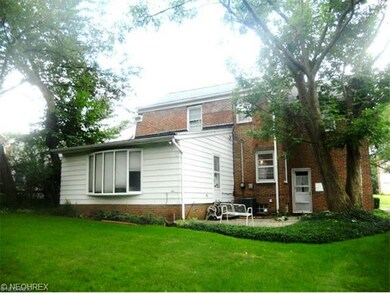 Good size back yard with mature trees for addition