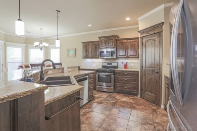 Spacious kitchen with extensive storage and granit