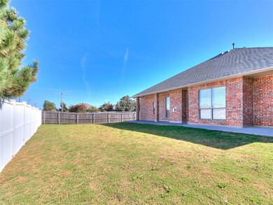 Fenced backyard featuring a patio area