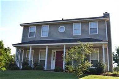 Look at that red door with the porch!
