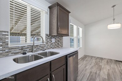 Wood Blinds/Stainless Steel Sink
