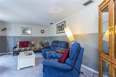 Family/Living room with lots of natural light, new