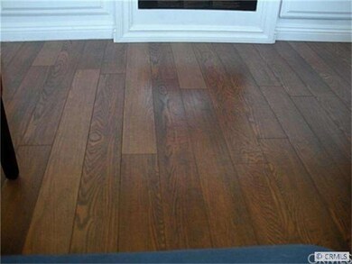 LOWER LEVEL FLOORING ALSO ON STAIRCASE