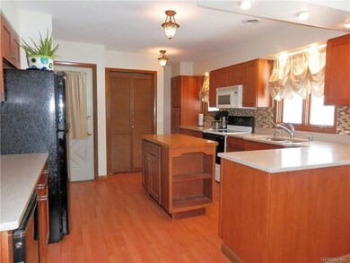 AMPLE CABINETS AND SOLID SURFACE COUNTERS
