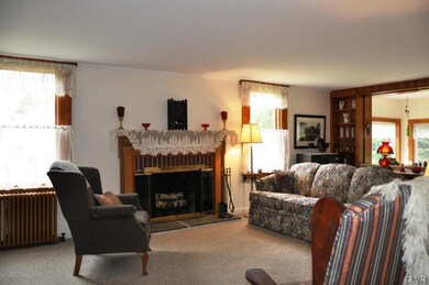 Brick fireplace in spacious living room