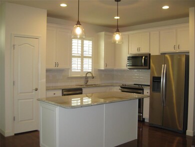 Large kitchen center island with solid surfact countertops