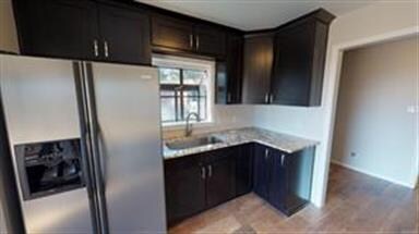 Granite Counter tops with inset sink and dramatic 