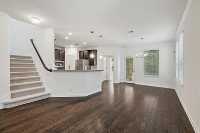 Unfurnished living room featuring dark wood-style