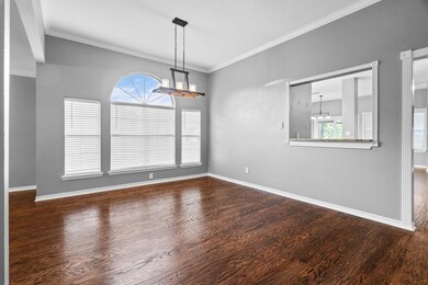 Empty room featuring hardwood / wood-style floors,