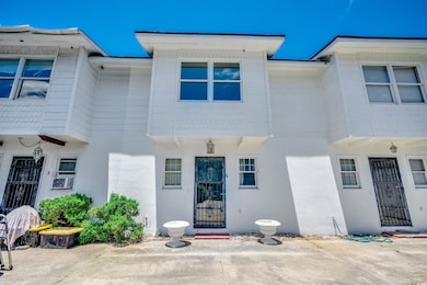 View of front of home featuring stucco siding