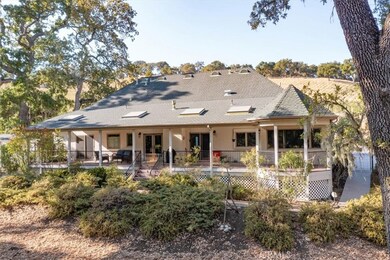The incredible back porch runs the length of the house.