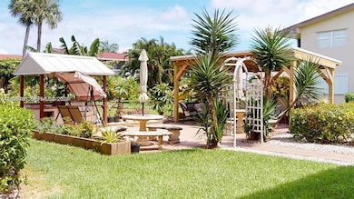 53 Coventry C, West Palm Beach, FL 33417 - photo 2