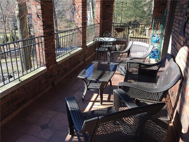 Quaint side porch for outdoor entertaining