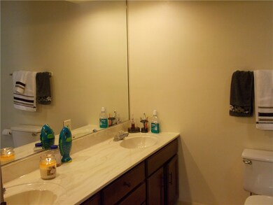 Master bath with dual vanity sinks.