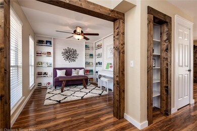 Office with custom bookshelves and custom Pine molding
