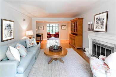 Formal Living Room leads into an incredible librar