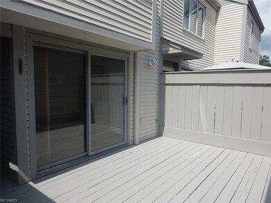 Kitchen side patio and entrance to garage