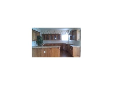Tons of cabinets and granite counters
