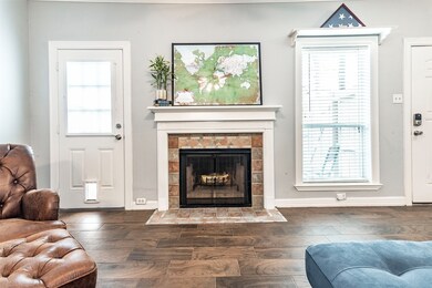Wood burning fireplace and beautiful neutral paint