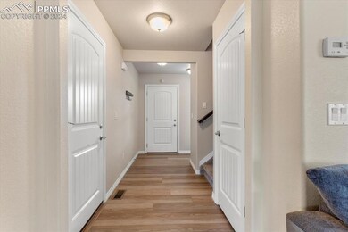 Hall featuringlow maintenance wood laminate floori