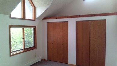 Guest Bedroom with Vaulted Ceilings