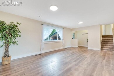 Formal entry with closet opens to the spacious liv