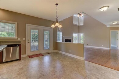 Breakfast area in the kitchen with open access to the patio.