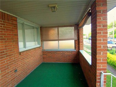 Exterior Front. Large front porch to sit and relax
