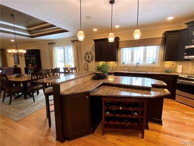 Gourmet kitchen with breakfast bar (note stools pe