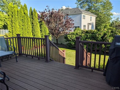 View of the partially fenced back yard.