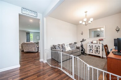 Foyer with view of family room and living room/off