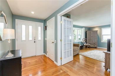 Foyer with French doors to living room