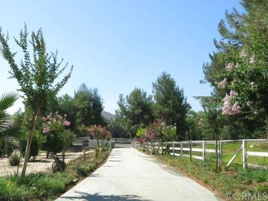 Long private driveway from street to house