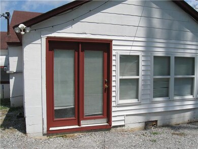 There is also a convenient back entrance into the utility/sunroom on the back.