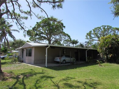 5960 Wisconsin St, Bokeelia, FL 33922 - photo 4