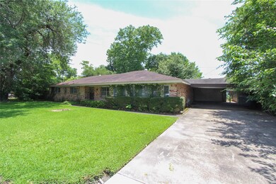 Home also offers an extended driveway for additional parking.