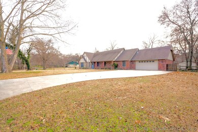 Large 1 acre lot with long extended drive way and