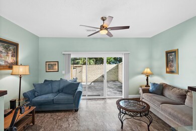 Living room with hardwood / wood-style floors and 