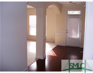 Other. Foyer Entrance with wood floors and columns