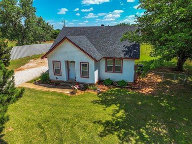 View of front of property with a front yard