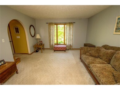 Foyer opens to living room
