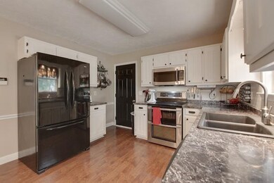 From this newly renovated kitchen you can access t