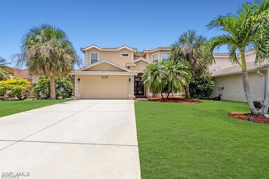 View of front of home with a garage, concrete driv