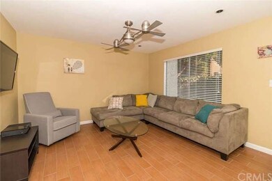 LIVING ROOM WITH NEW PORCELAIN TILE