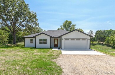 245 Hawkins Ave, Crocker, MO 65452 - photo 2