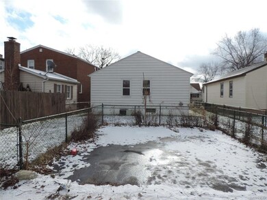 Back view & parking area.