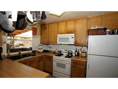 Kitchen. Kitchen, with a window to the back patio,